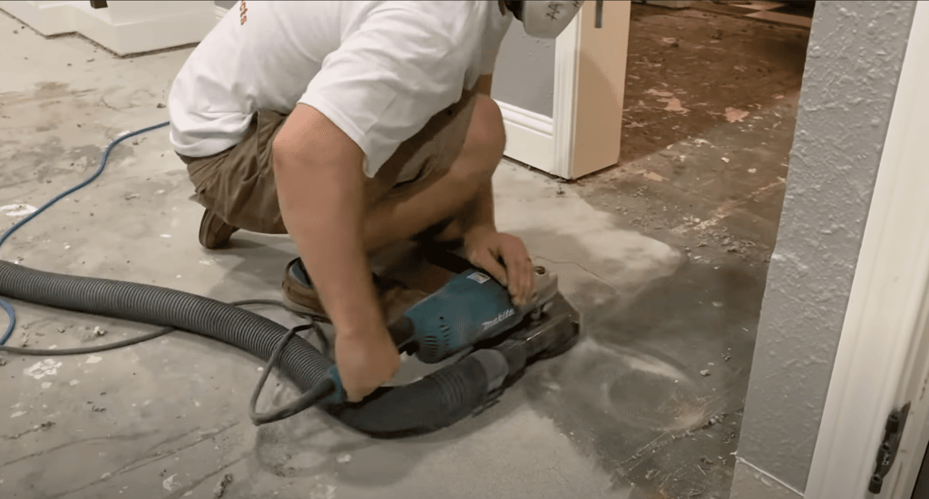 The homeowner sanded down the entire floor to ensure that the whole floor was equally leveled throughout the entire downstairs.